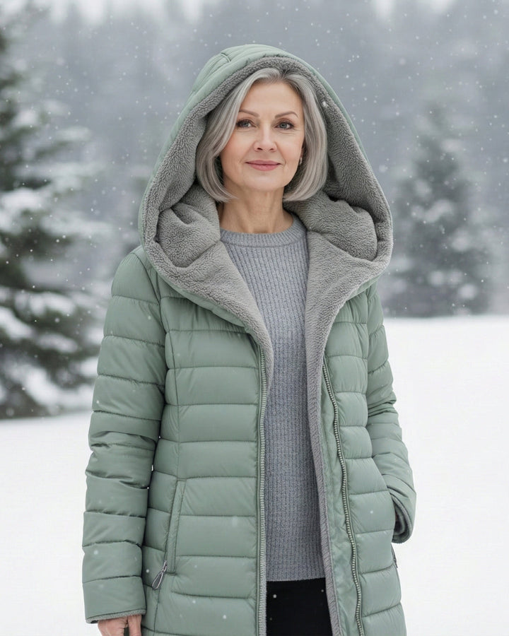 Bennett and Lowe Marguerite hooded quilted winter jacket shown in black with a padded design and front zipper.