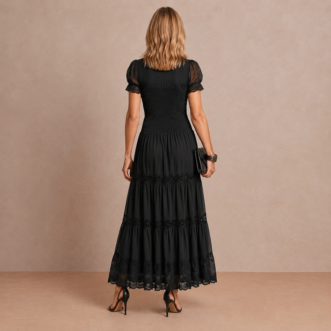 Sophia sheerness lace maxi dress by Bennett and Lowe featuring intricate lace details and a flowing silhouette.
