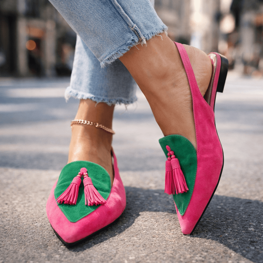 Handwoven Eliza flat sandals with tassels by Bennett and Lowe, featuring intricate weaving and stylish ankle straps.