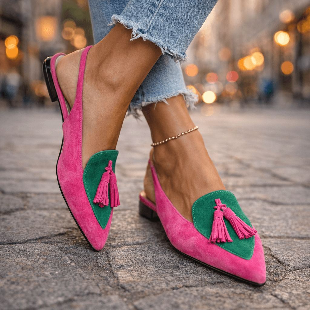 Eliza handwoven tassel flat sandals by Bennett and Lowe featuring colorful woven straps and tassel accents.