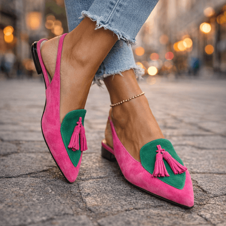 Eliza handwoven tassel flat sandals by Bennett and Lowe featuring colorful woven straps and tassel accents.