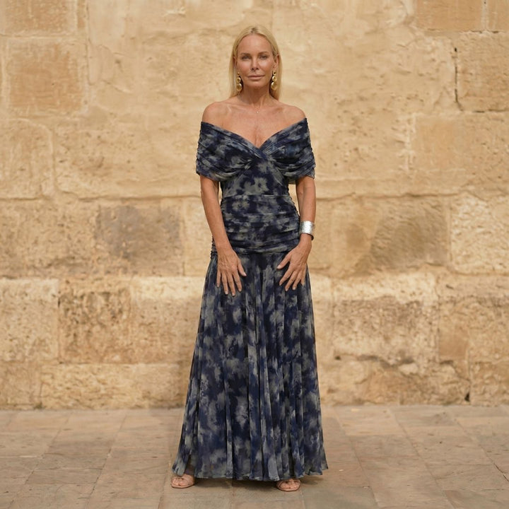 Elegant flowing Melissa vestidos signature dress by Bennett and Lowe, featuring a stylish, lightweight design and intricate details.