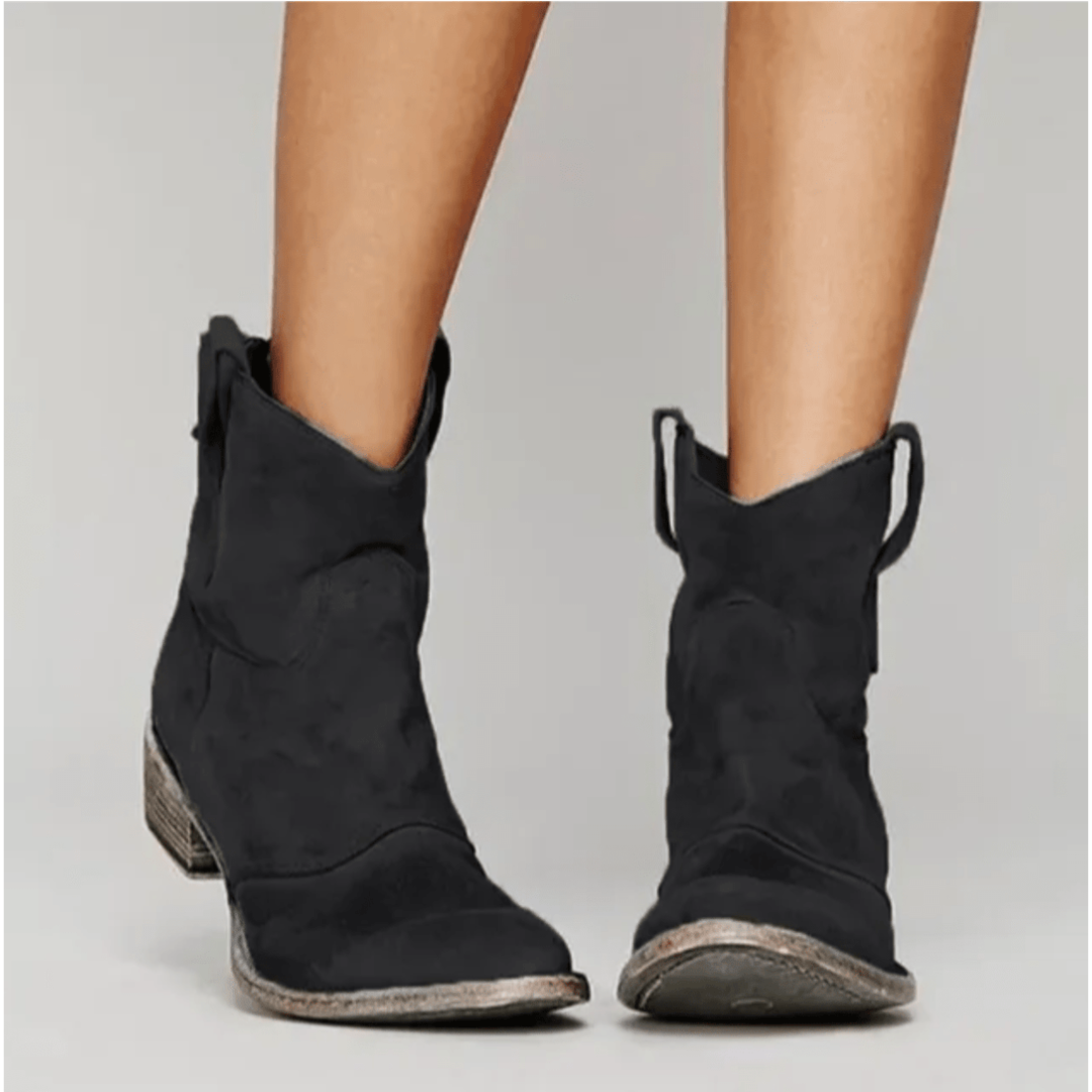 Charlotte Bennett and Lowe comfort suede ankle boots featuring a sleek design and low heel, perfect for casual or dressy wear.