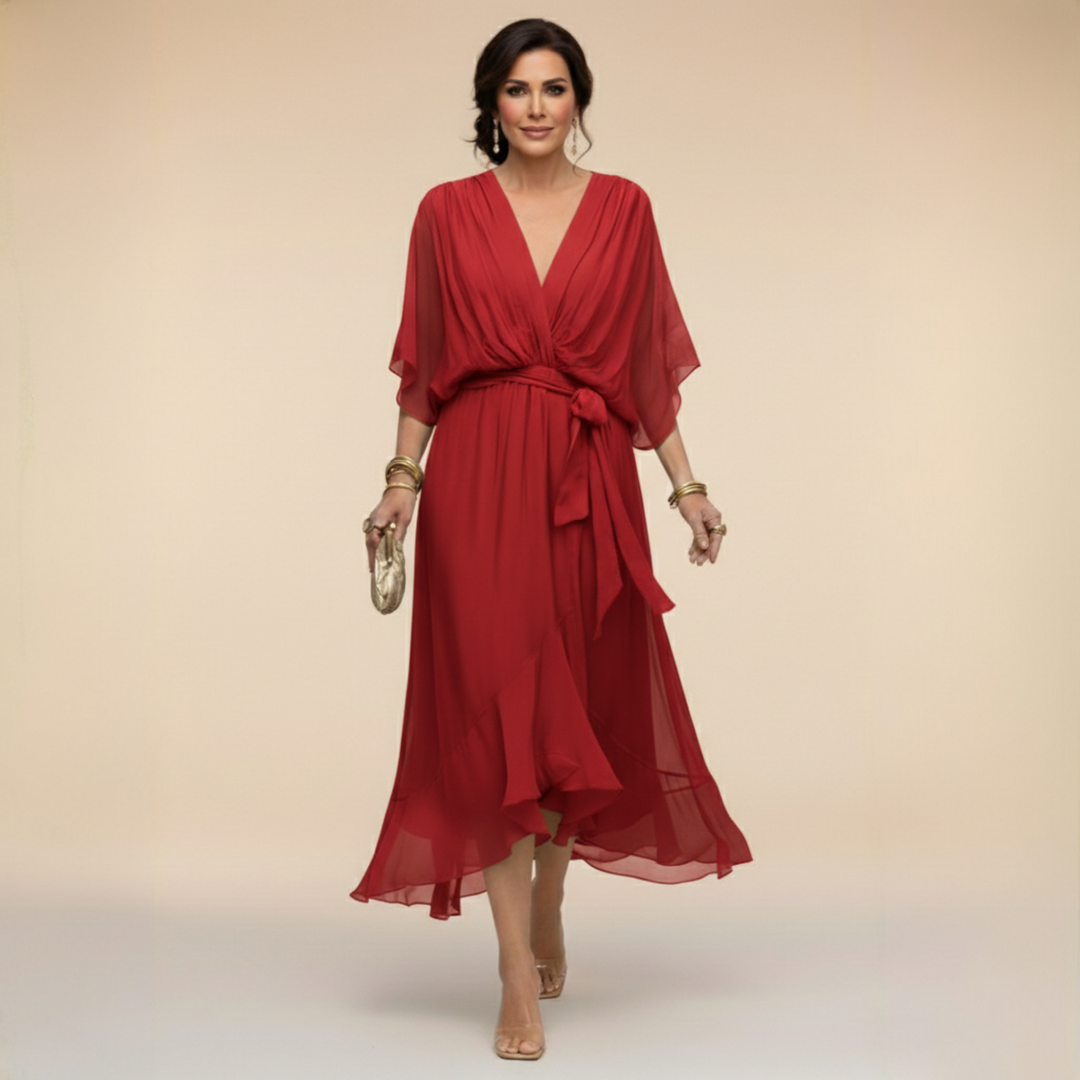 Clara wrap V-neck dress by Bennett and Lowe, featuring a stylish V-neckline and elegant wrap design, shown in a natural fabric drape.