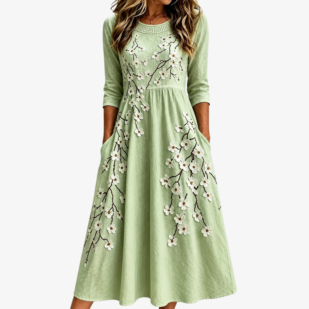 Sage Blossom Garden Pocket Midi Dress for Women by Bennett and Lowe, featuring floral print and a practical pocket design.