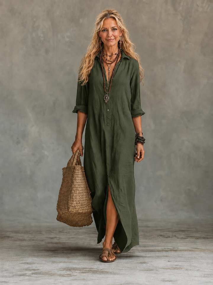 Vivienne button-down maxi dress in flowing fabric, featuring a fitted waist and long sleeves, perfect for elegant summer wear.
