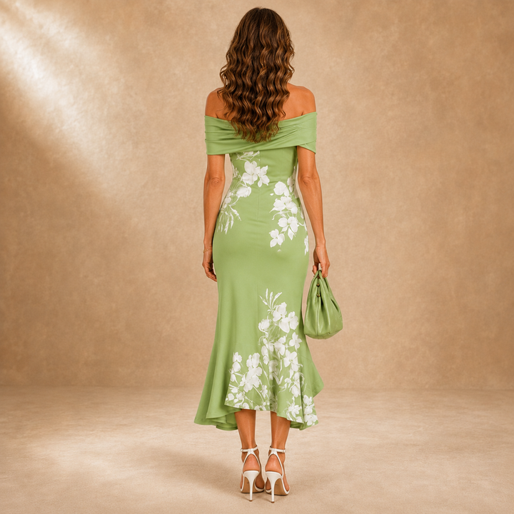 Flora contour floral midi dress by Bennett and Lowe featuring a fitted waist, midi length, and vibrant floral pattern.