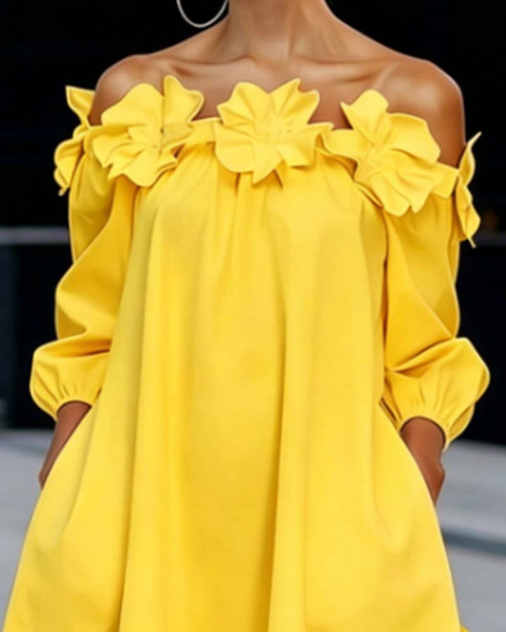 Rhoda™ off-shoulder floral appliqué dress by Bennett and Lowe, featuring a feminine design with floral details and elegant silhouette.