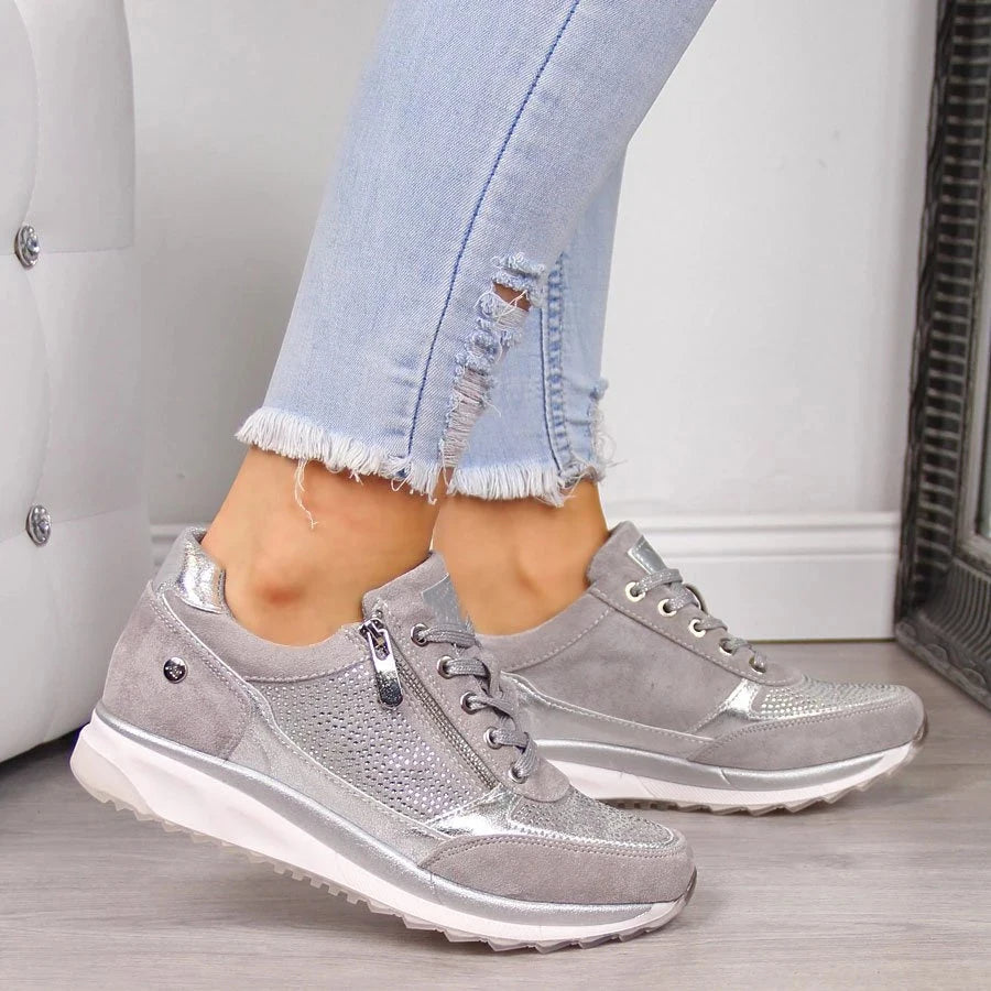 Bennett and Lowe Calliope sparkle lace-up sneaker with convenient side zipper.
