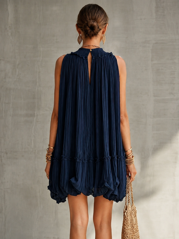 Bennett and Lowe Camilla chiffon halter mini dress with flowing fabric and sleeveless design, perfect for summer occasions.