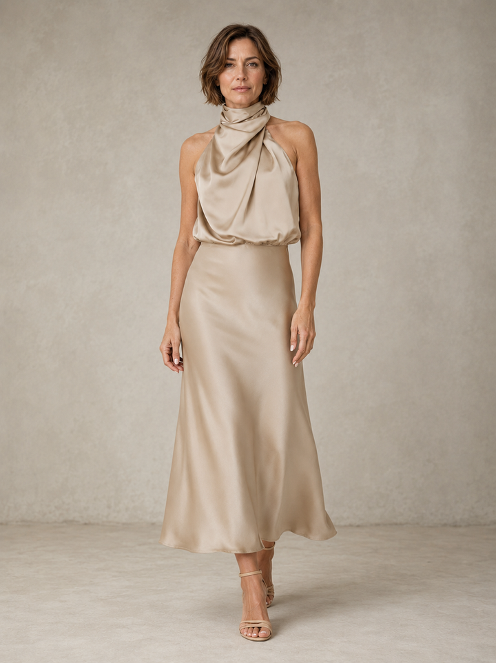 Violet & Grace Harper halter satin evening dress in elegant black, featuring a sleek halter neckline and flowing satin fabric.