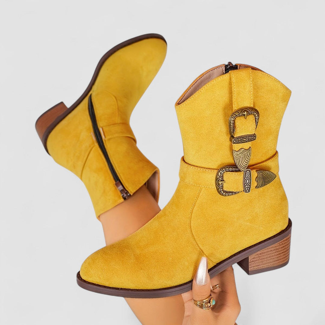 Rosa suede ankle boot for women with buckle strap and low heel, stylish Bennett and Lowe footwear on a neutral background.