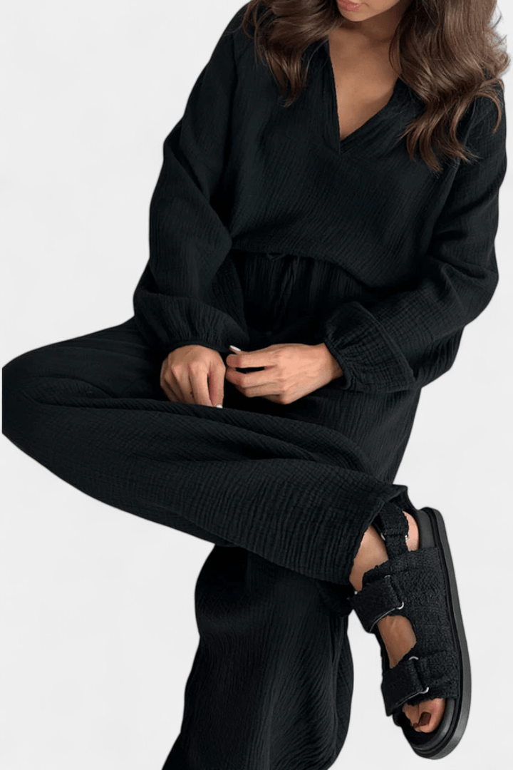 Kendra Bennett and Lowe V-neck long-sleeve two-piece set for women, featuring a wide-leg pant and matching top in a stylish design.