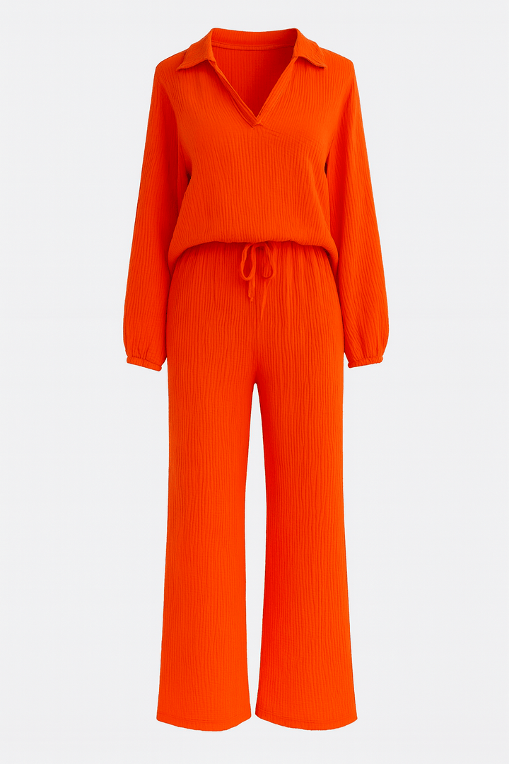 Kendra Bennett and Lowe women's V-neck long-sleeve wide-leg two-piece set, showcasing the stylish, comfortable outfit on a model.