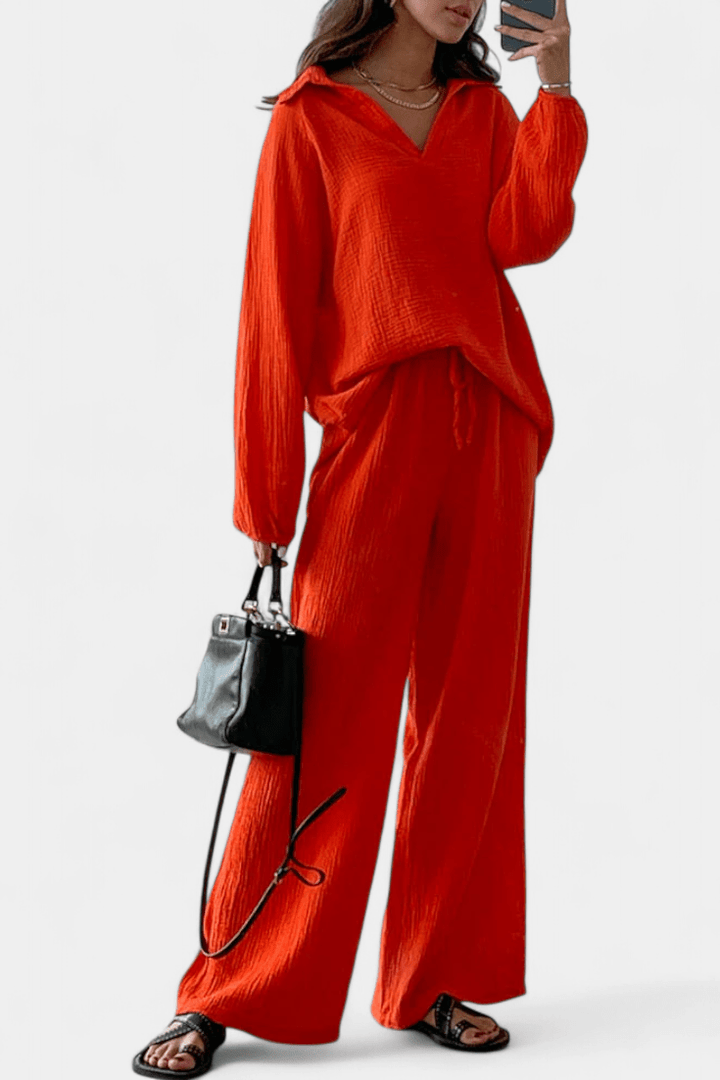 Women's Bennett and Lowe Kendra V-neck long-sleeve wide-leg two-piece set, featuring a stylish V-neck top and flowing pants.