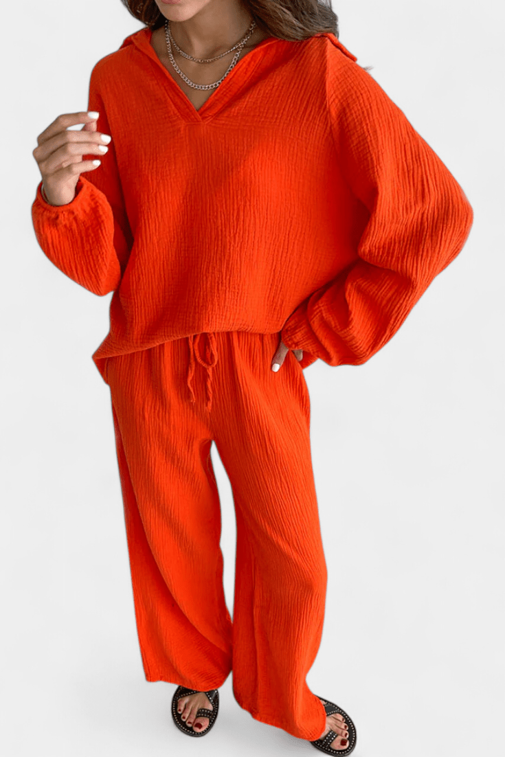 Kendra Bennett and Lowe women's v-neck long-sleeve wide-leg two-piece set, shown in a stylish, casual outfit.