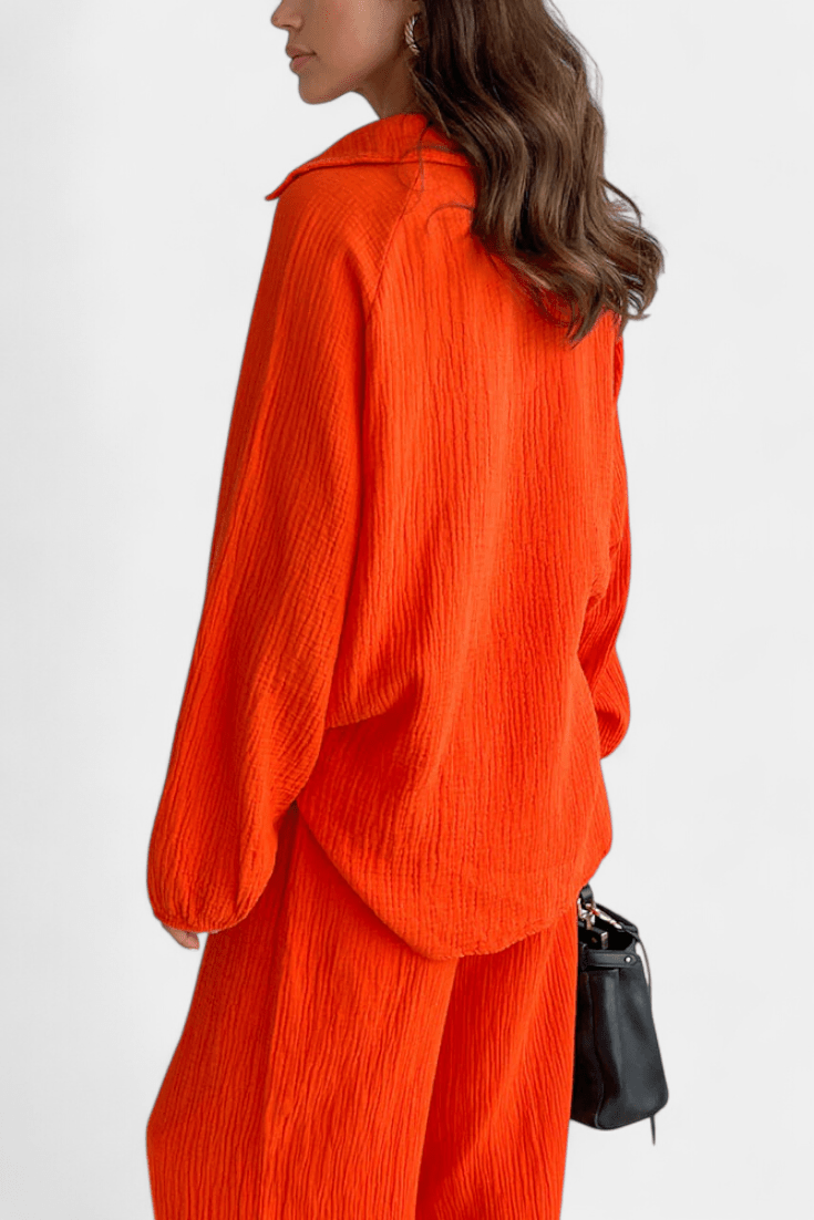 Kendra Bennett and Lowe women's V-neck long-sleeve wide-leg two-piece set, shown in a stylish, relaxed fit.
