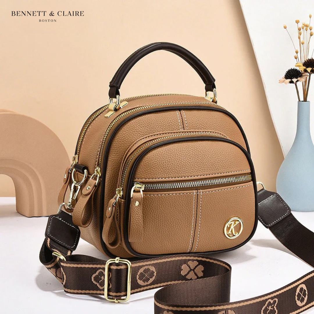 Vivienne compact adjustable crossbody bag by Bennett and Lowe, featuring a sleek design with a long adjustable strap.