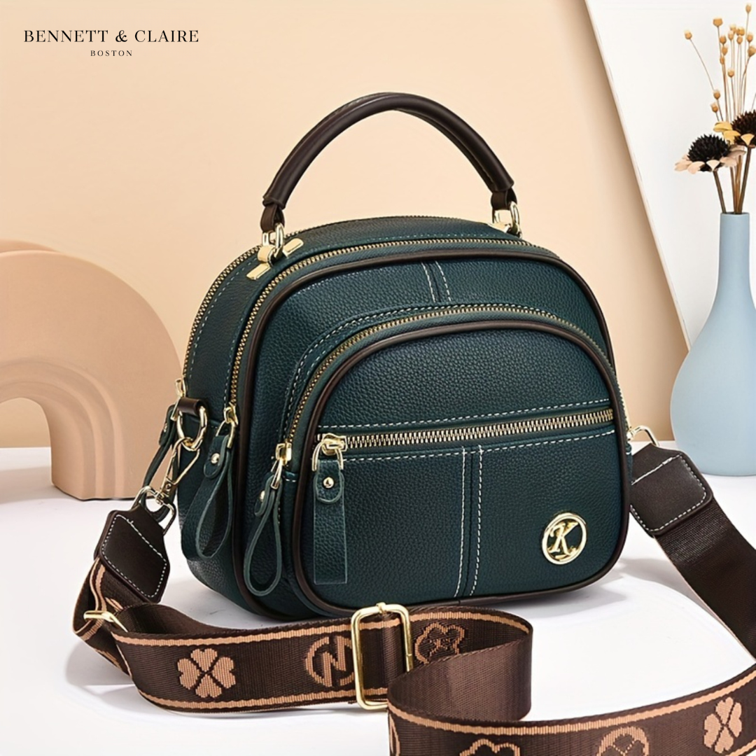 Vivienne compact adjustable crossbody bag by Bennett and Lowe, shown in black with a sleek strap and minimalist design.