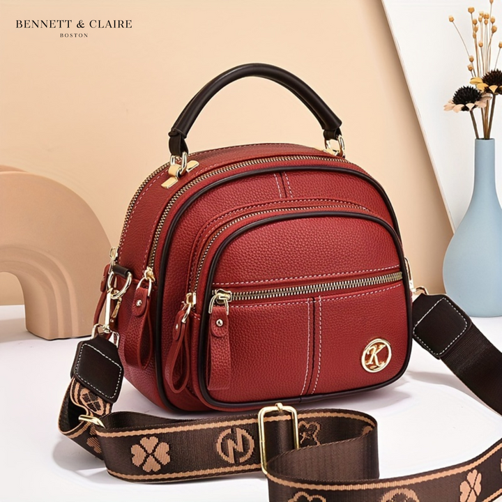 Vivienne compact adjustable crossbody bag by Bennett and Lowe, featuring a sleek design and adjustable strap.