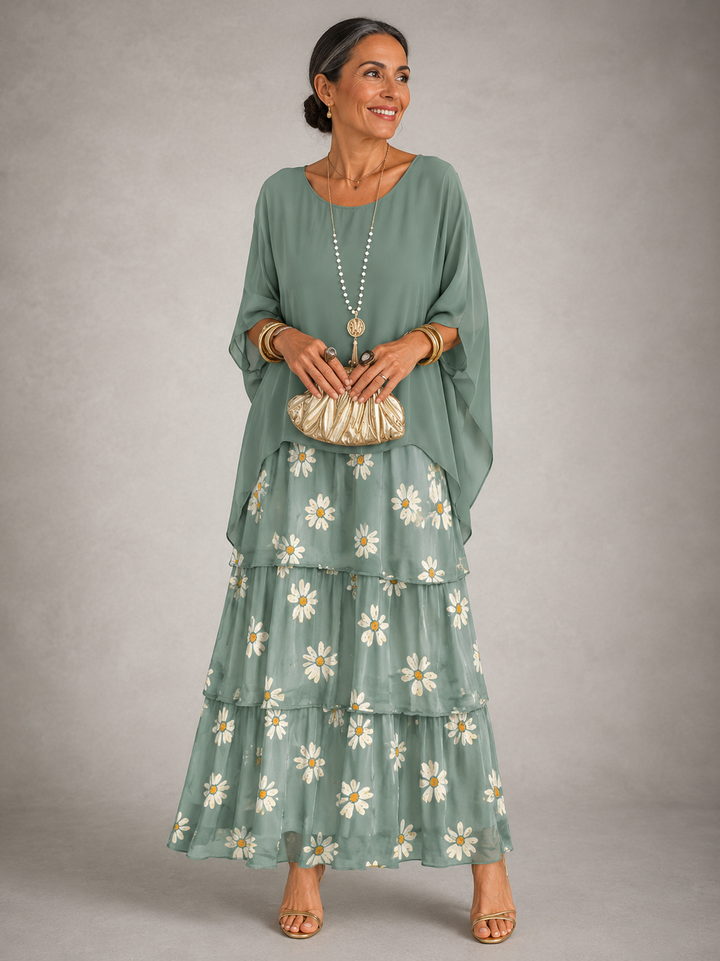 Elegant flowing maxi dress by Bennett and Lowe, featuring a feminine silhouette with soft fabric and intricate detailing.