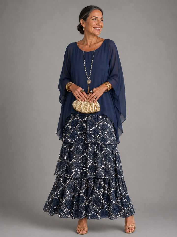 Elegant flowing maxi dress by Bennett and Lowe featuring a feminine silhouette and soft fabric in a stylish design.