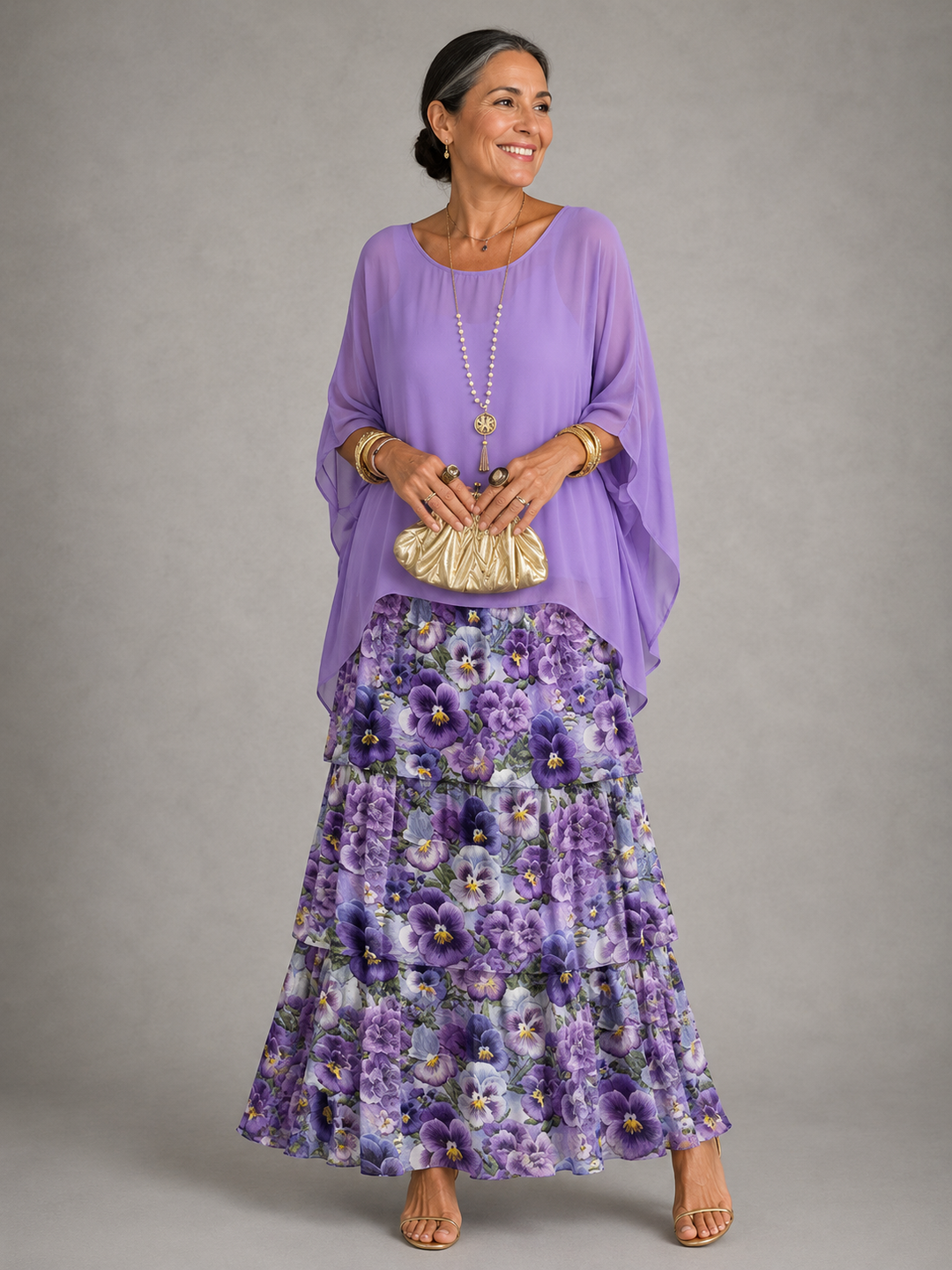 Elegant flowing maxi dress by Bennett and Lowe, featuring a femme style with soft fabric and graceful design.