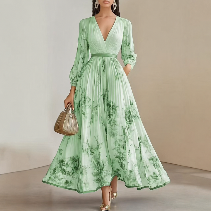 Celeste floral maxi dress for women by Bennett and Lowe, featuring pleated fabric and a flowing, elegant design.