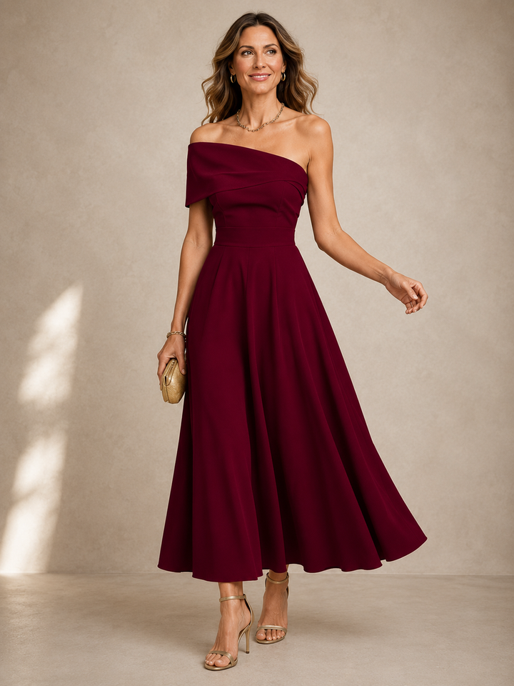 Violet Bennett and Lowe maxi dress featuring a graceful sweeping design, flowing fabric, and elegant silhouette.