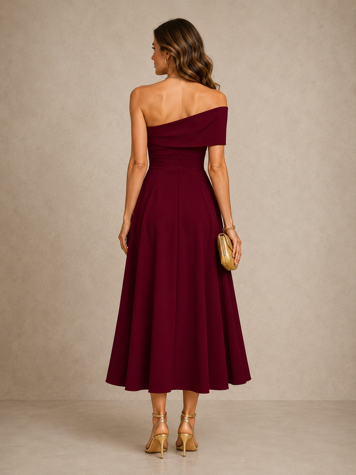 Violet Bennett and Lowe maxi dress featuring a graceful sweeping silhouette and flowy fabric, perfect for elegant occasions.