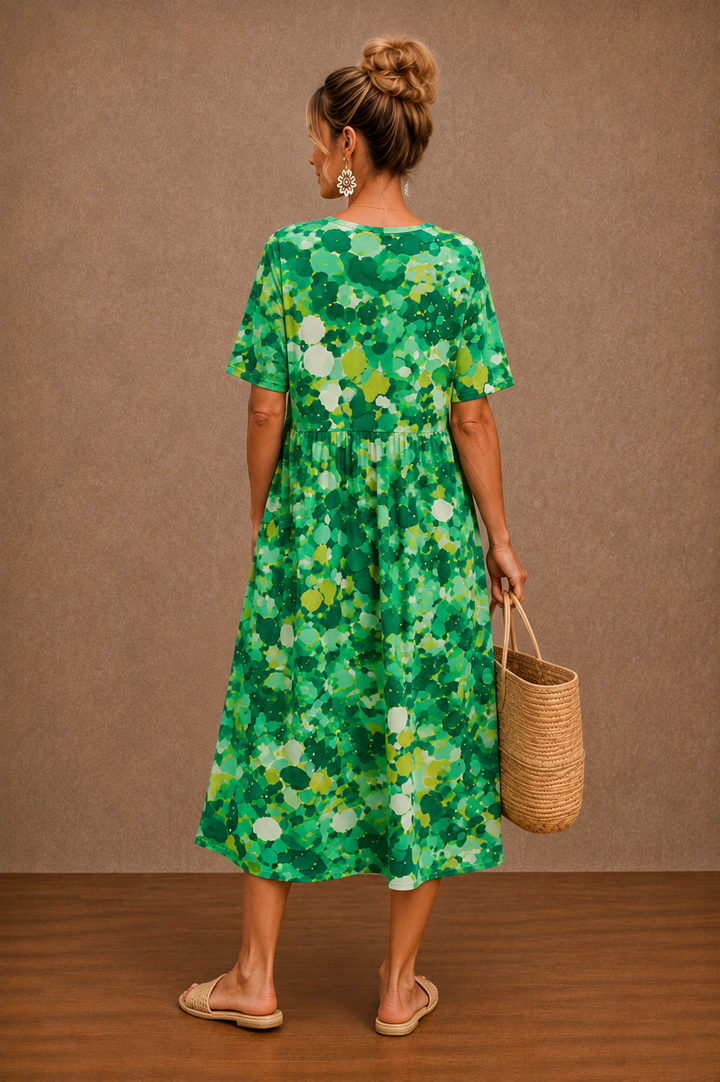 Hazel floral summer midi dress by Bennett and Lowe, featuring a flowy fabric and vibrant flower print.