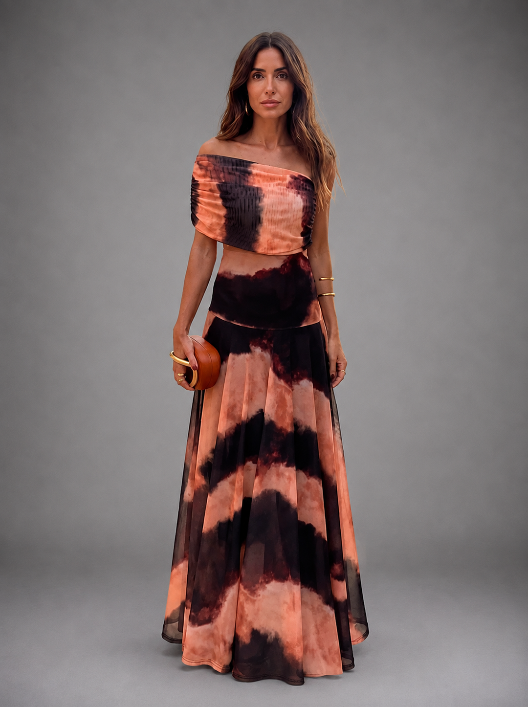 Bianca women's maxi dress by Bennett and Lowe with orange and brown floral print, flowing fabric, and V-neck design.