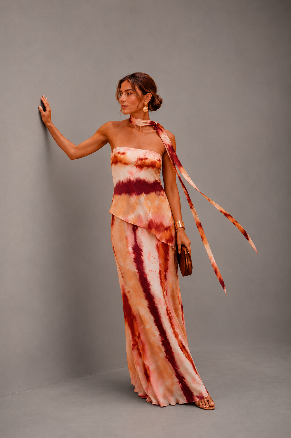Printed strapless maxi dress for women by Bennett and Lowe featuring a flowing design and vibrant pattern.