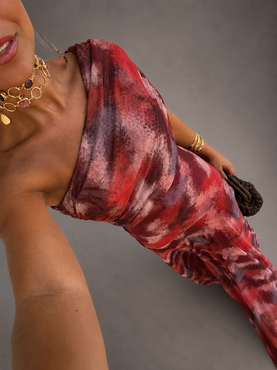 Valentina watercolor off-shoulder maxi dress for women by Bennett and Lowe, flowing fabric with a vibrant watercolor floral pattern.