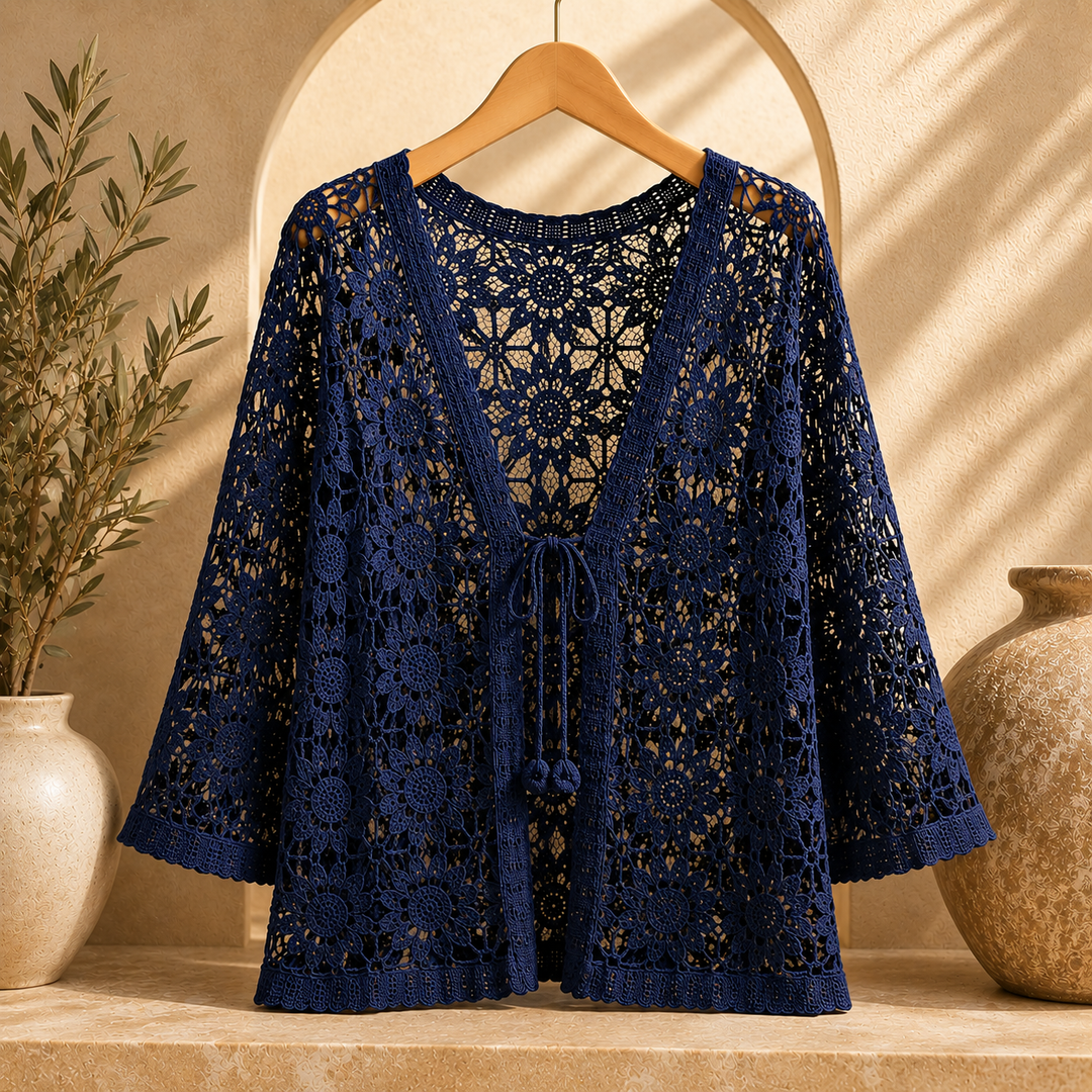Elora crochet cardigan by Bennett and Lowe, featuring intricate knit pattern, long sleeves, and open-front design.