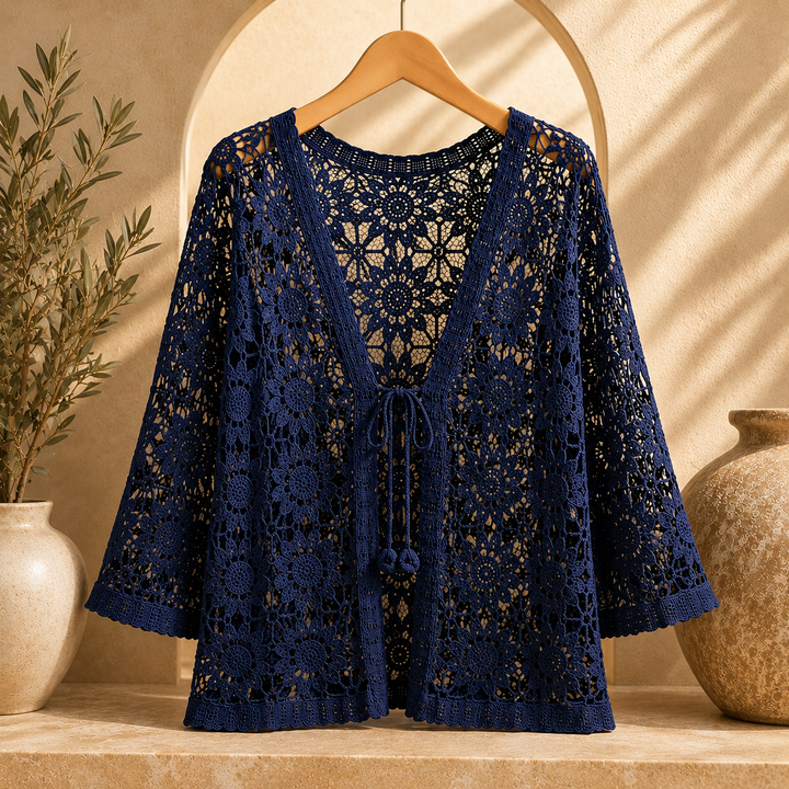 Elora crochet cardigan by Bennett and Lowe, featuring intricate knit pattern, long sleeves, and open-front design.