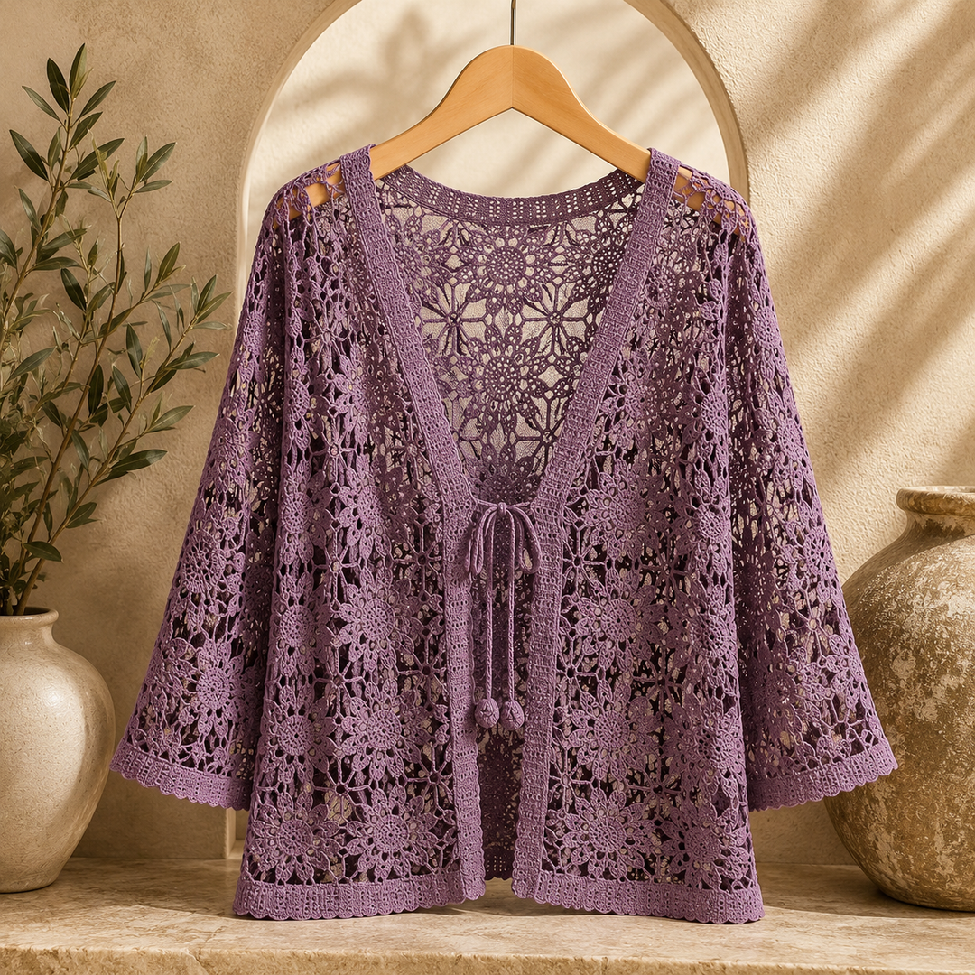 Elora crochet cardigan by Bennett and Lowe, featuring intricate knit pattern and lightweight design, displayed on a neutral background.