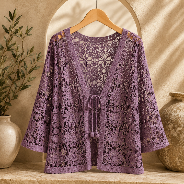 Elora crochet cardigan by Bennett and Lowe, featuring intricate knit pattern and lightweight design, displayed on a neutral background.