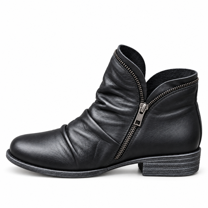 Corinne Bennett and Lowe round-toe ankle boots in black leather, featuring a sleek design and low heel for everyday wear.