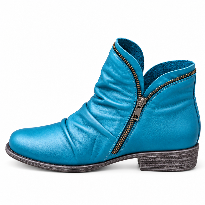 Corinne Bennett and Lowe round-toe ankle boots with sleek design and ankle-high style, featuring smooth leather finish.