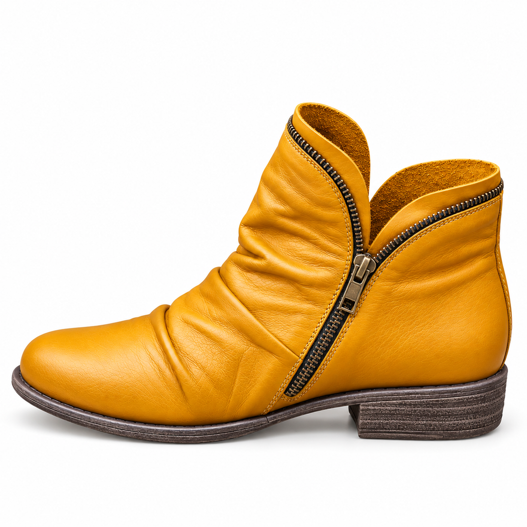 Corinne Bennett and Lowe round-toe ankle boots in black leather, featuring a sleek silhouette and ankle height design.