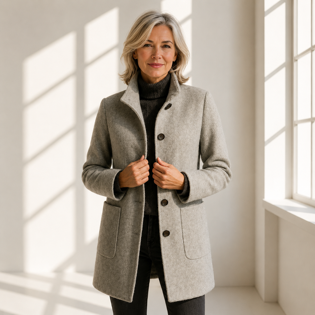 Tailored midi coat for women with button-front design by Bennett and Lowe, featuring a classic fit and structured silhouette.