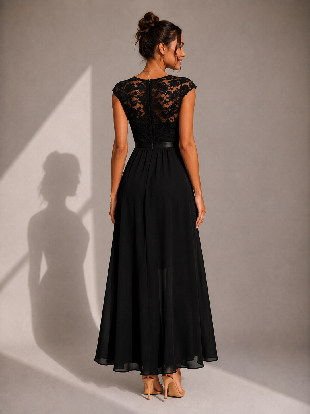 Rosalind lace bodice high-low maxi dress by Bennett and Lowe, flowing fabric with intricate lace details and elegant silhouette.