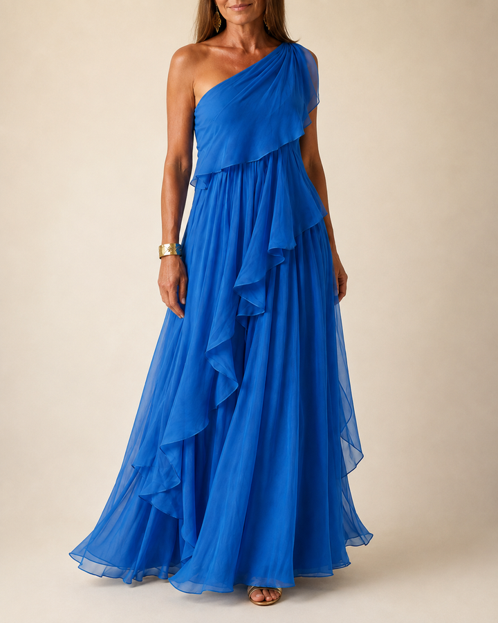 Ela cascading ruffle maxi dress by Bennett and Lowe, flowing fabric with layered ruffles, displayed on a model.