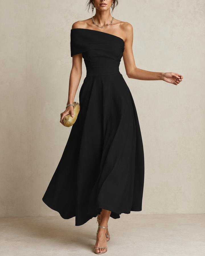 Wenda Bennett & Lowe maxi dress in flowing fabric with floral pattern and sleeveless design, perfect for summer wear.