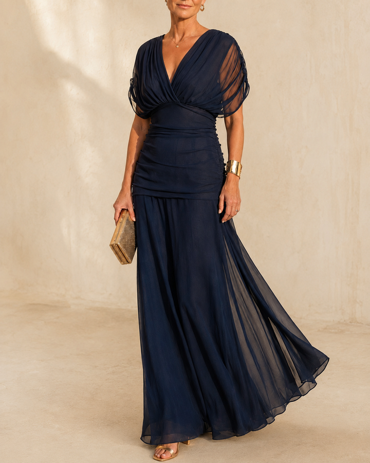 Seraphine Bennett and Lowe ruched flutter midi dress with elegant design, featuring flowing fabric and stylish details.