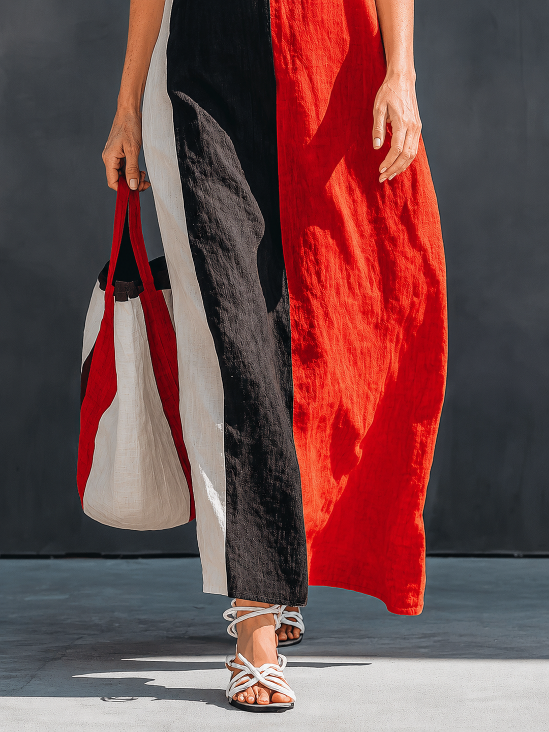 Helena Bennett and Lowe color-block linen-blend maxi dress with sleeveless design and flowing silhouette, perfect for warm weather.