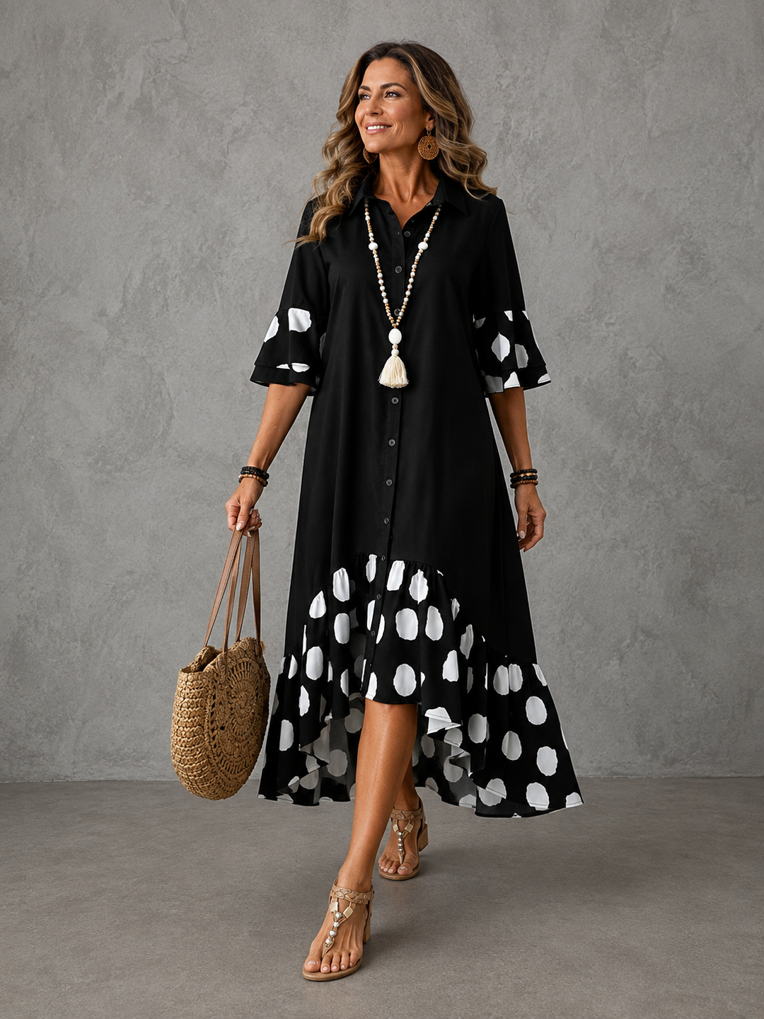 Beatrice Bennett and Lowe polka dot lapel dress shown on a hanger, featuring a fitted waist and classic polka dot pattern.