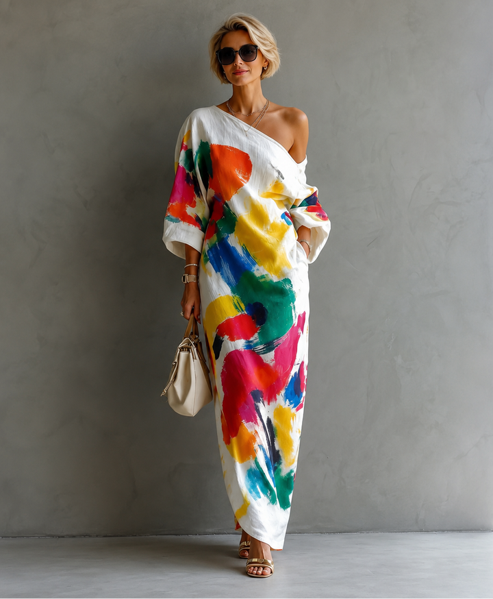 Bennett and Lowe Adeline abstract print maxi dress featuring flowing fabric and vibrant geometric patterns.