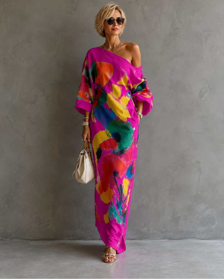 Adeline abstract print maxi dress by Bennett and Lowe featuring flowing fabric and vibrant geometric patterns.
